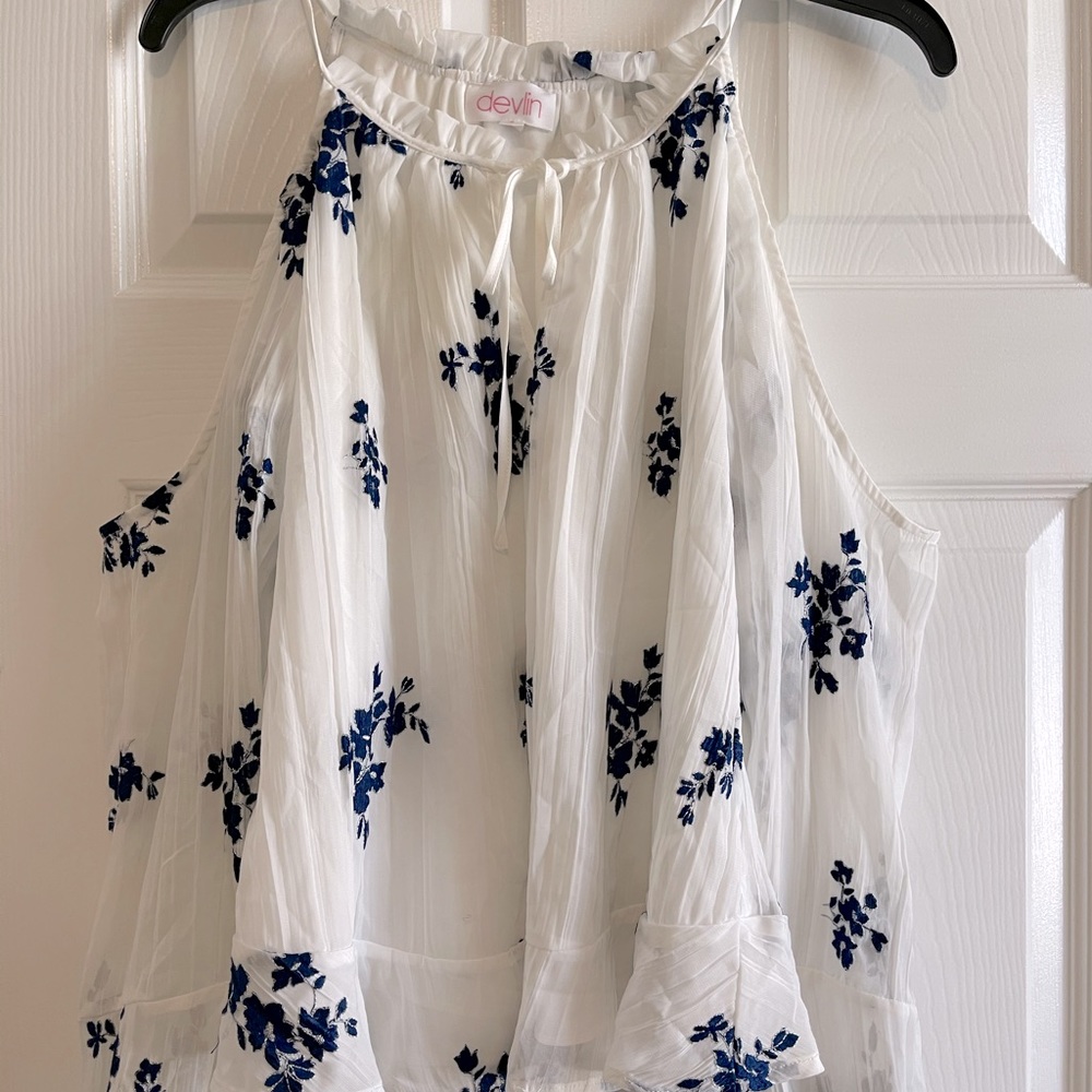 Open shoulder blouse.